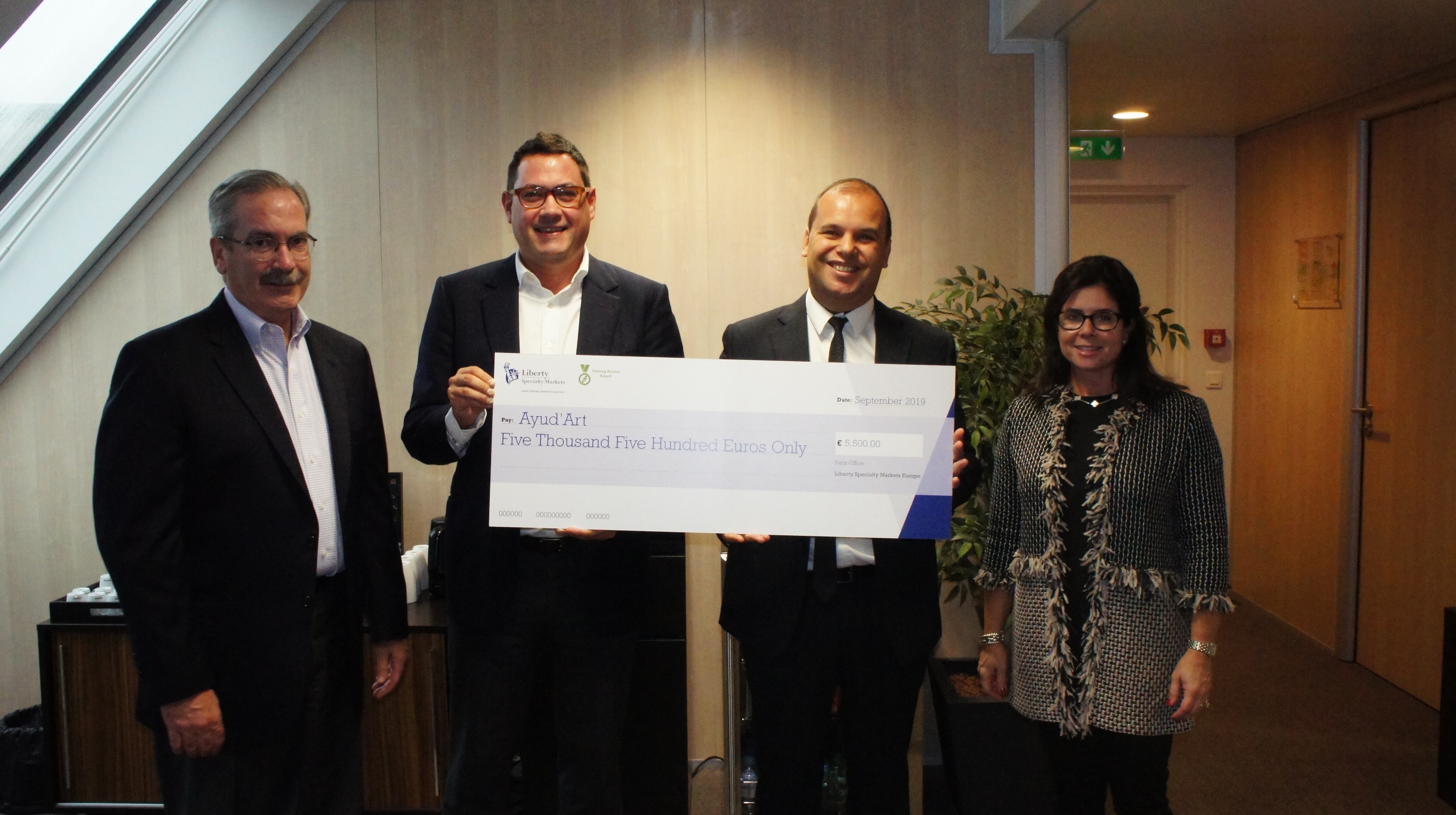 Matthew Moore and winnders of unsung hero award