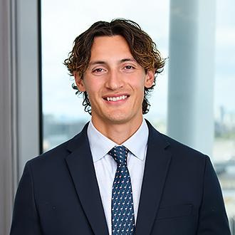 Headshot of Niall Tsang-Wetherald
